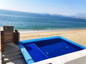 INCREIBLE DEPARTAMENTO A PIE DE PLAYA EN MANZANILLO, COMPLETAMENTE NUEVO